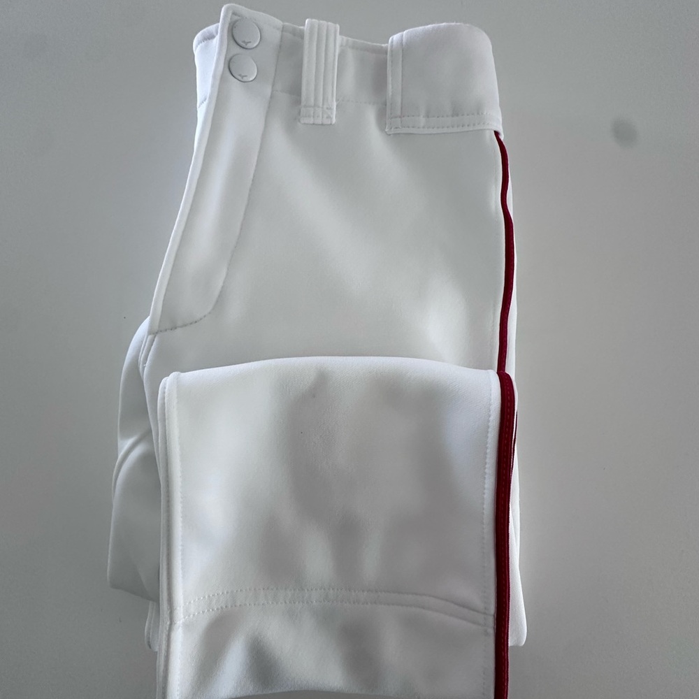 Youth Large Mizuno full length baseball pants whit with red stripe